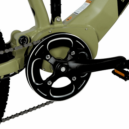 Close-up of the front chainring on an e-bike, featuring an aluminum bash guard to protect the chainring teeth and secure the chain, providing enhanced durability for off-road riding.