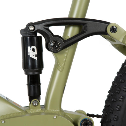 Close-up of the Exa Form A5-RE air shock on an e-bike, designed to provide cushioning and comfort for city riding, gravel trekking, and light-duty cross-country mountain biking.