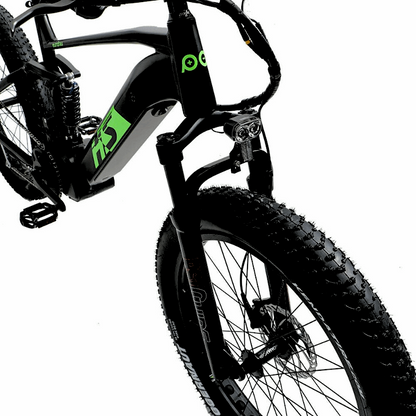 Full front view of the FAT-HS eBike, showing the fat tires, suspension fork, and handlebar with the eBike's headlight attached.