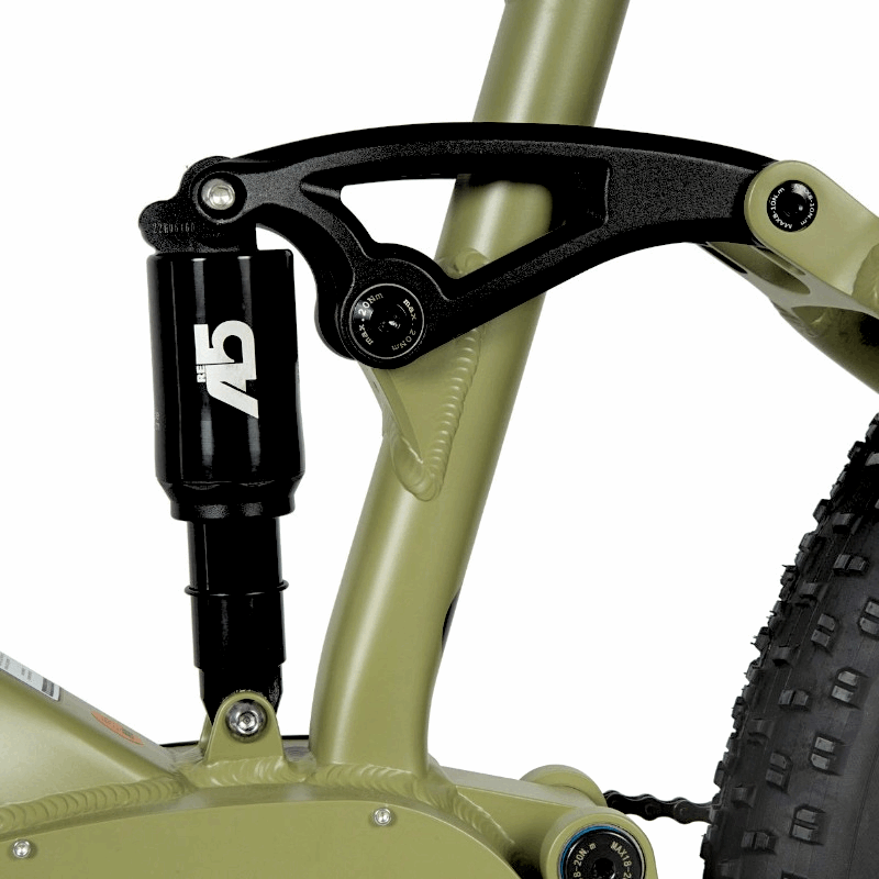 Close-up of the Exa Form A5-RE air shock on an e-bike, designed to provide cushioning and comfort for city riding, gravel trekking, and light-duty cross-country mountain biking.