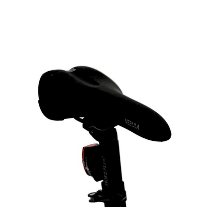 Side view of the FAT-HS eBike’s saddle labeled "Nebula," highlighting the comfortable seat and rear-mounted LED light for added safety.