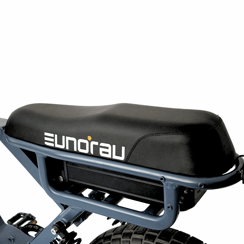 Close-up of an e-bike's padded seat with the Eunorau logo, designed for comfort and support during extended rides.