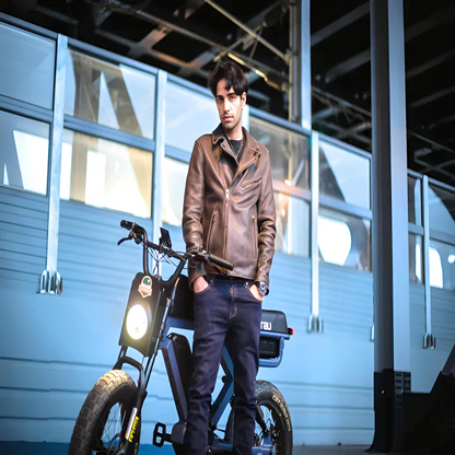 A rider standing next to the EUNORAU e-bike in an urban setting, emphasizing the bike's modern and sleek design.