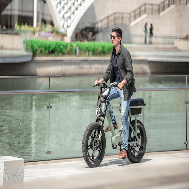 A rider performing a wheelie on the EUNORAU e-bike, demonstrating its powerful acceleration and agility on a modern street.