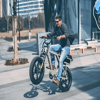 A rider cruising the EUNORAU e-bike along a modern riverside path, showcasing the bike's urban riding appeal and smooth performance.