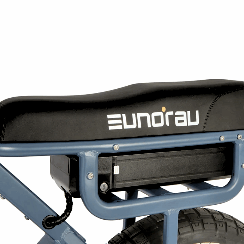 Close-up of an e-bike's padded seat with the Eunorau logo and battery compartment underneath, designed for comfort and easy access to the battery.