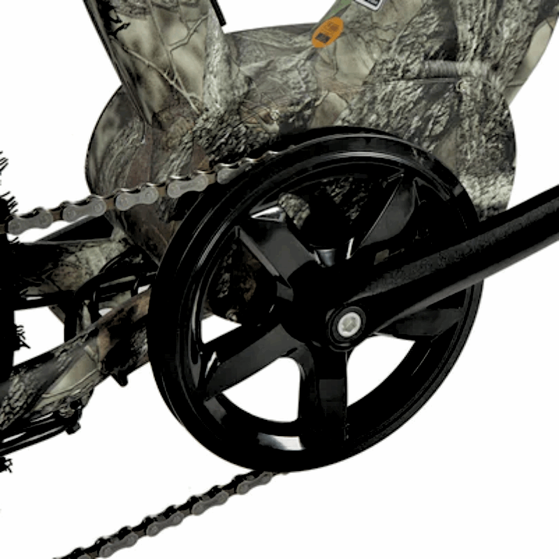 Close-up of an e-bike crankset and pedal assembly, featuring a black chainring and camo-patterned frame with large, rugged fat tires for off-road riding.