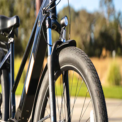 Front view of the META275 eBike showing the front suspension and LED headlight.