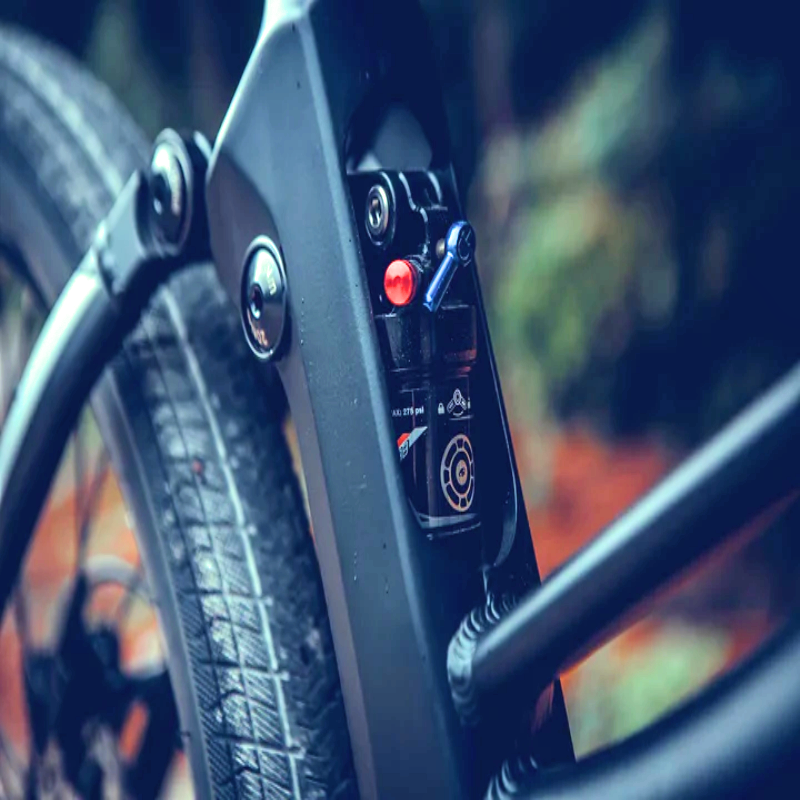 Close-up of the rear suspension shock absorber on the SPECTER-ST eBike.