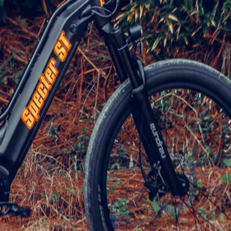 Close-up of the front wheel and fork with SPECTER ST branding on the SPECTER-ST eBike.