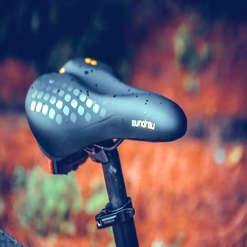 Close-up of the EUNORAU branded saddle on the SPECTER-ST eBike.