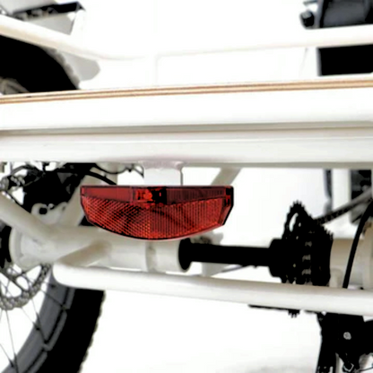 Rear reflector under the cargo basket of the eTRIKE for increased visibility.