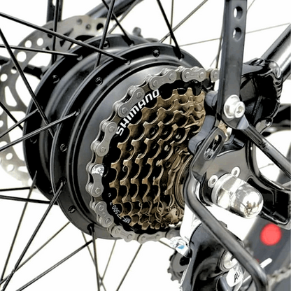 Close-up of the Shimano rear cassette and motor on the FAT-AWD Winter E-Bike, emphasizing the gear system and motor.