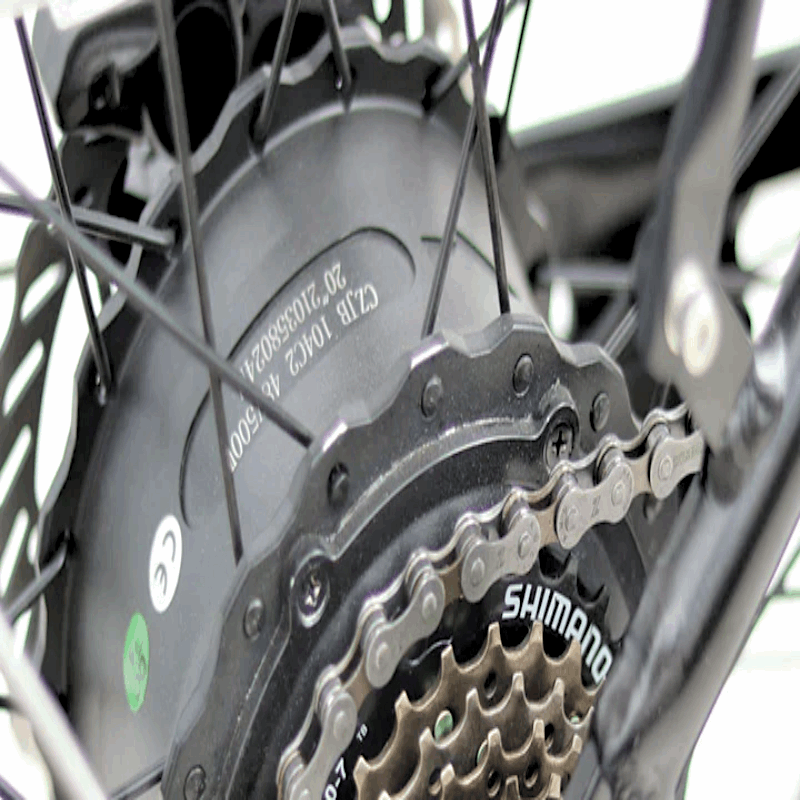 Close-up of the rear hub motor and Shimano drivetrain on the FAT-MN Folding eBike, highlighting the 500W power output.