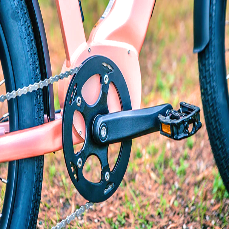 Close-up of the EUNORAU pedal system on the pink META24 eBike.