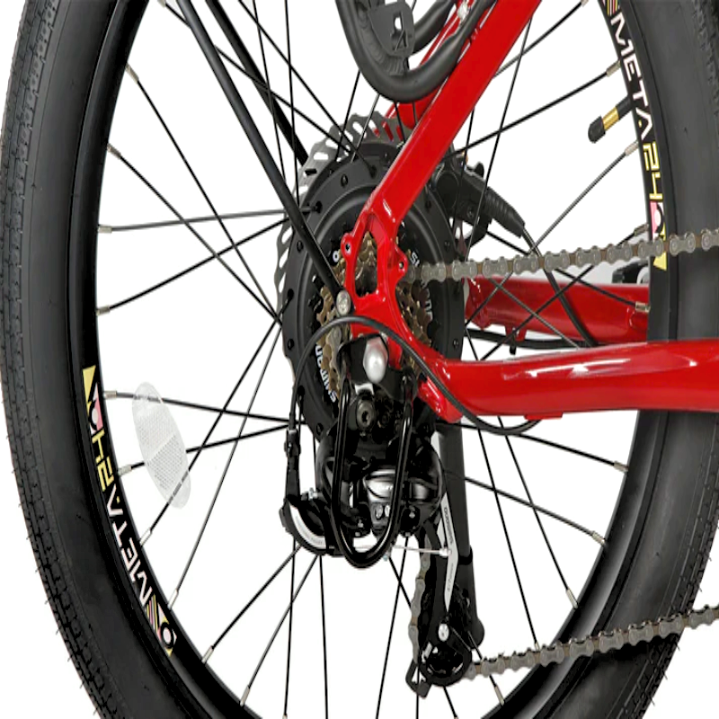 Close-up view of the rear wheel and drivetrain of the EUNORAU eBike, showing the rear derailleur, chain, and the large META24 tire with reflective accents on the spokes.